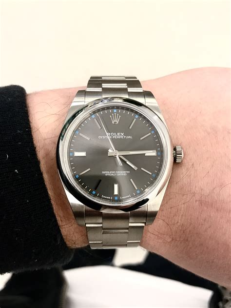 rolex oyster perpetual 114300 on a strap|Rolex Oyster Perpetual dark rhodium.